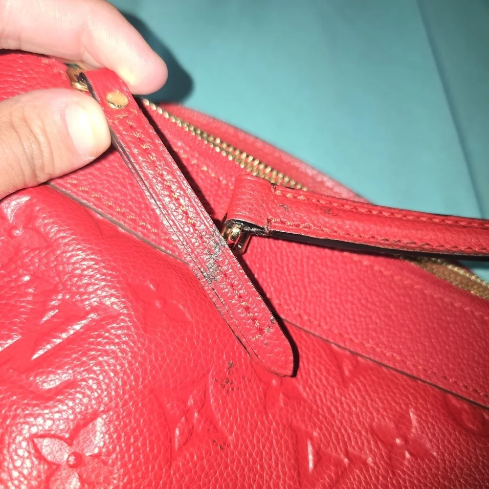 Authentic Louis Vuitton Red Monogram Emperiente Leather Bag